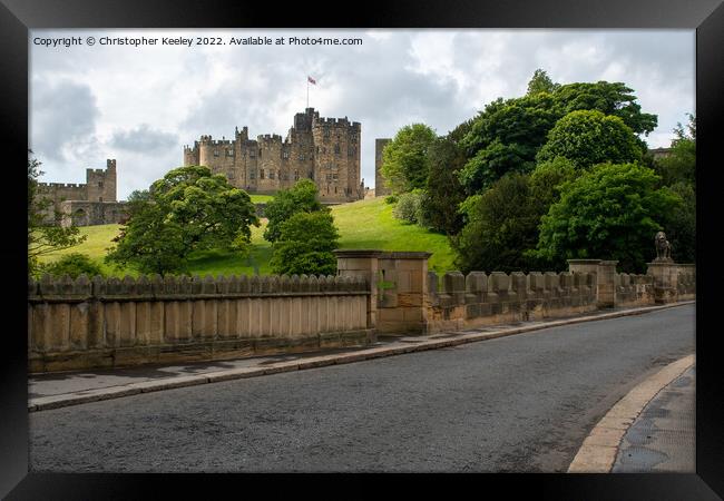 Alnwick Castle and bridge Framed Print by Christopher Keeley