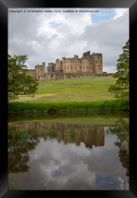Reflections of Alnwick Castle Framed Print by Christopher Keeley