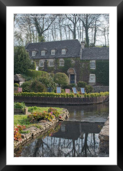 Cotswolds hotel and deck chairs in Bibury Framed Mounted Print by Christopher Keeley