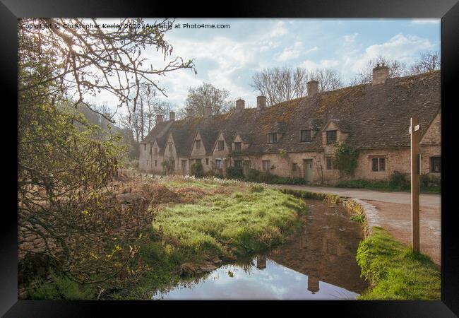 Reflections at Arlington Row in the Cotswolds Framed Print by Christopher Keeley