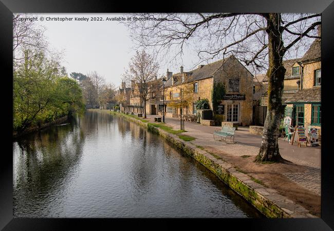 Early morning in Bourton-on-the-Water Framed Print by Christopher Keeley