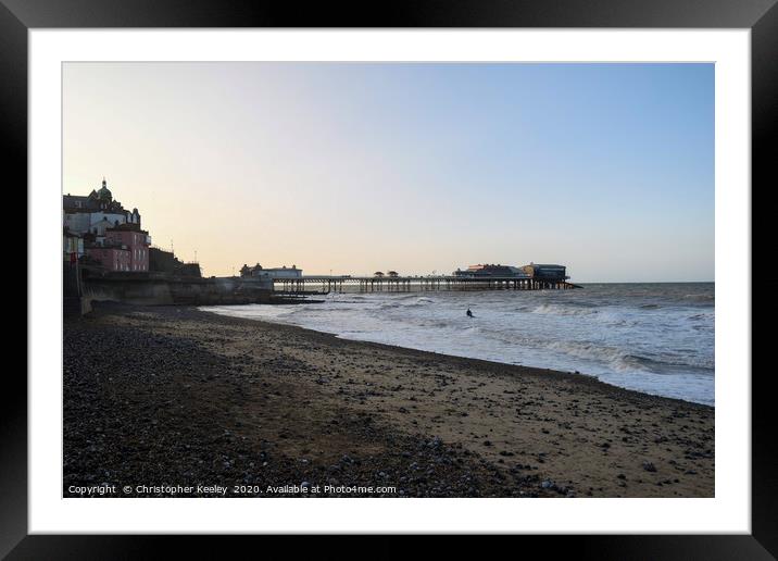 Cromer pier and beach at golden hour Framed Mounted Print by Christopher Keeley