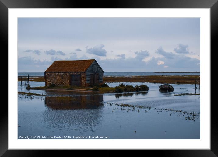 North Norfolk coal barn surrounded by sea Framed Mounted Print by Christopher Keeley