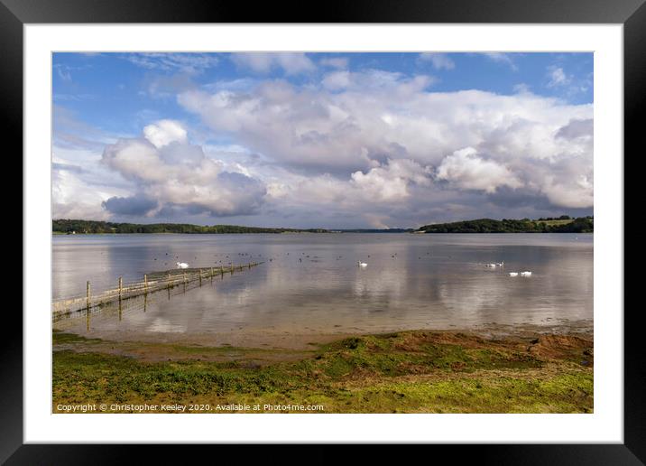 Cloudy skies over Rutland Water Framed Mounted Print by Christopher Keeley