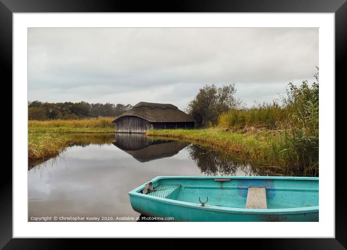 Hickling Broad boat houses Framed Mounted Print by Christopher Keeley