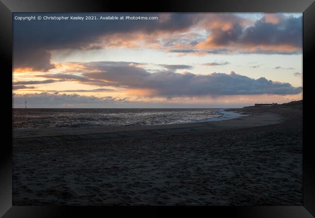 Colourful sunrise over Caister beach  Framed Print by Christopher Keeley