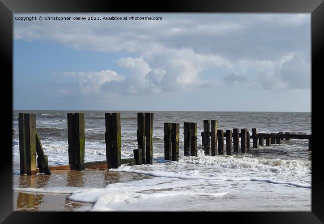 Cloudy skies over Gorleston beach Framed Print by Christopher Keeley