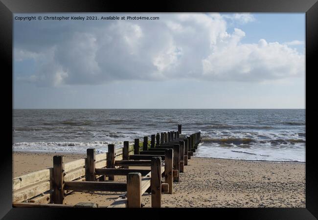 Cloudy skies over Gorleston beach Framed Print by Christopher Keeley