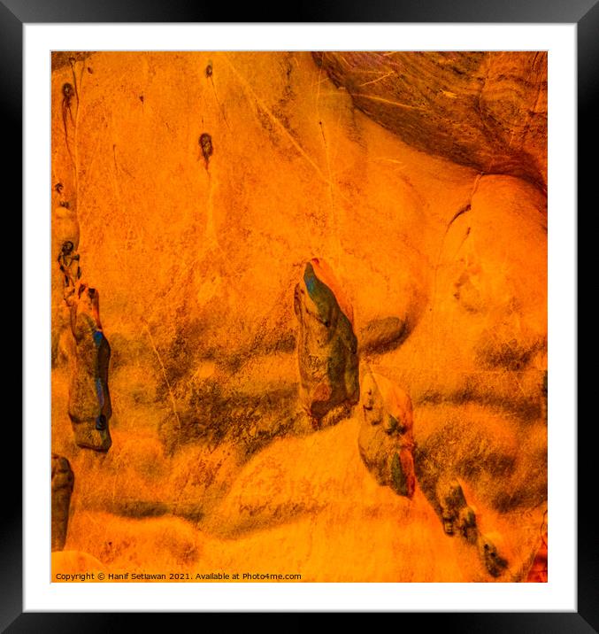 Gnomes or trolls on yellow cave wall. Framed Mounted Print by Hanif Setiawan