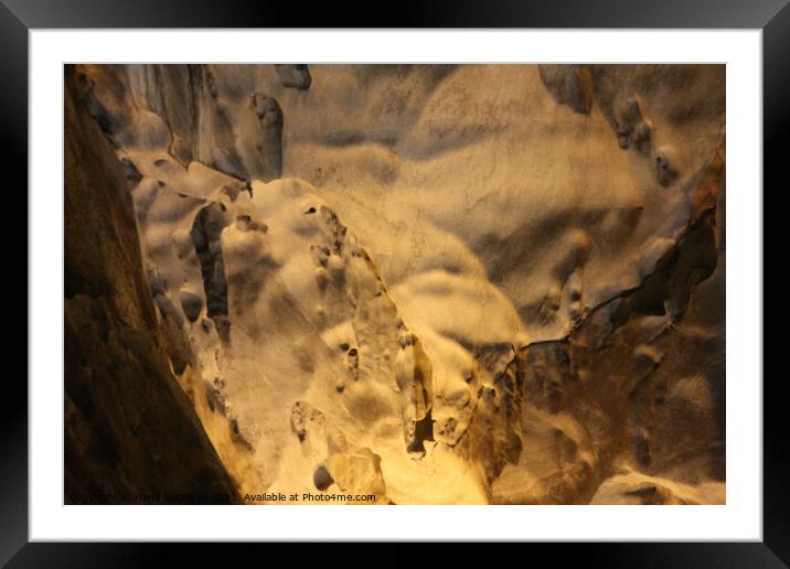Gnomes or trolls on creme white cave wall. Framed Mounted Print by Hanif Setiawan