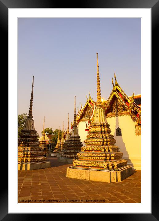 A group of small stupa at Phra Chedi Rai Buddha te Framed Mounted Print by Hanif Setiawan