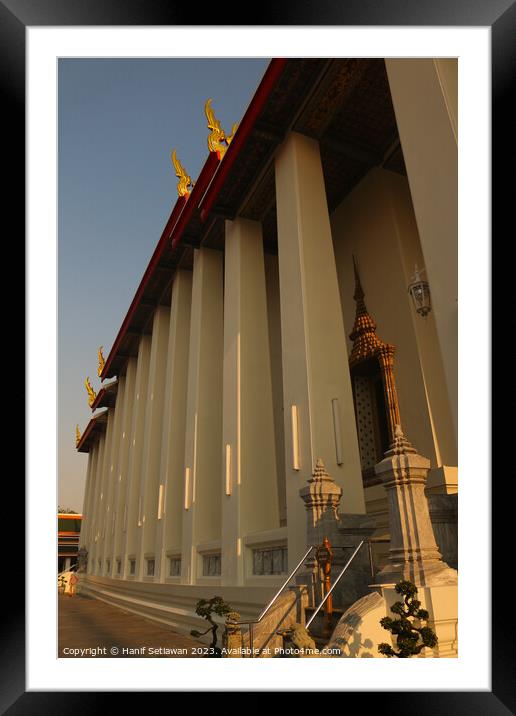 Phra Ubosot Buddha hall with white columns. Framed Mounted Print by Hanif Setiawan