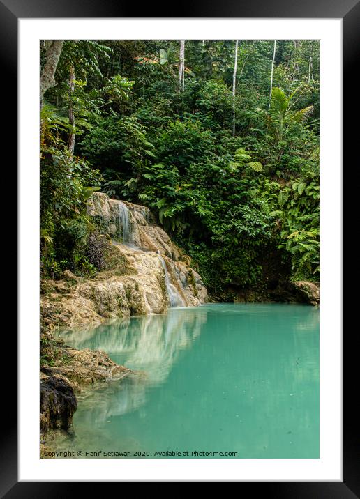 Mudal waterfall with turquoise water Framed Mounted Print by Hanif Setiawan