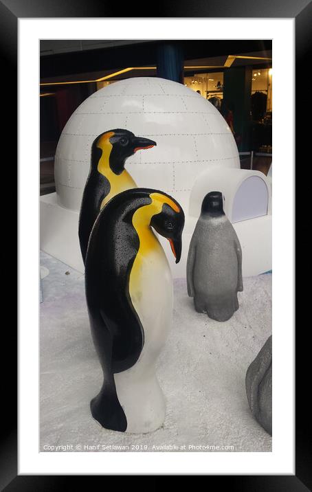 group of Penguin sculptures in front of an igloo 3 Framed Mounted Print by Hanif Setiawan
