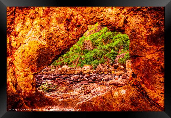rock archway on fire Framed Print by Hanif Setiawan