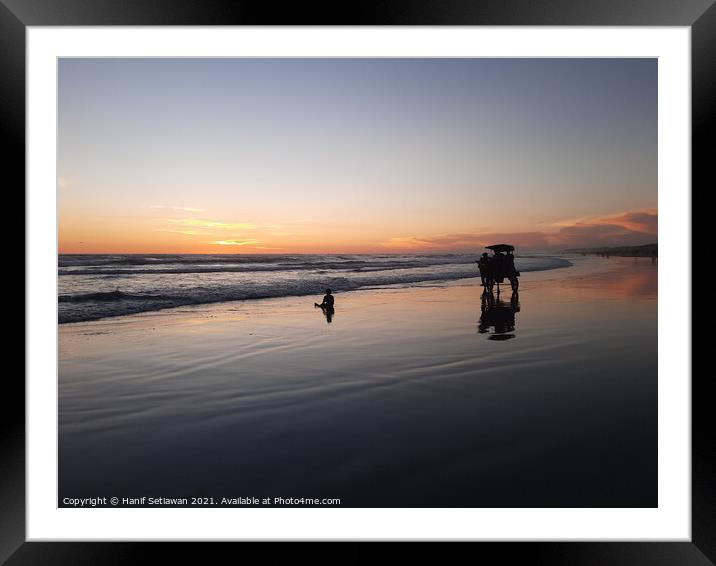 Silhouetted horse-drawn carriage beach sunset 6 Framed Mounted Print by Hanif Setiawan