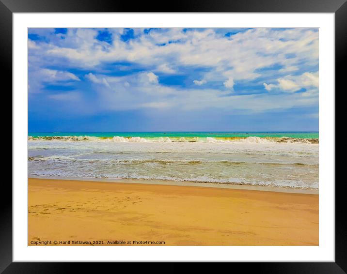 Sand beach wavy sea and cloud sky 1b Framed Mounted Print by Hanif Setiawan