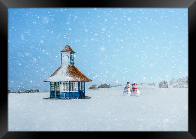 Snowy day at Frinton with cute snowmen Framed Print by Paula Tracy