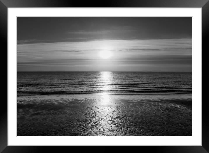 Sunrise over the sea at Frinton in timeless black  Framed Mounted Print by Paula Tracy