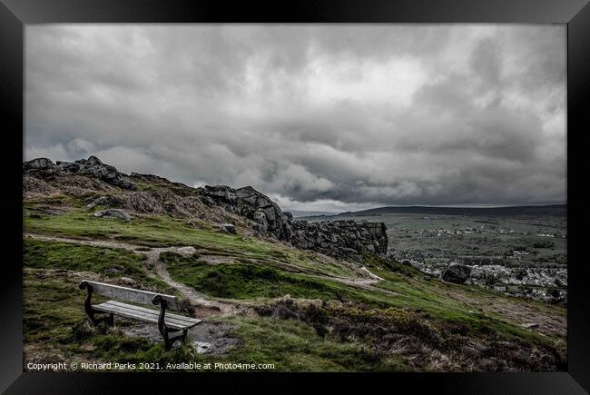 Moody skies over Ilkley Moor Framed Print by Richard Perks