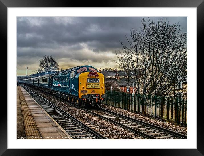 Preserved Deltic locomotive under storm clouds Framed Mounted Print by Richard Perks