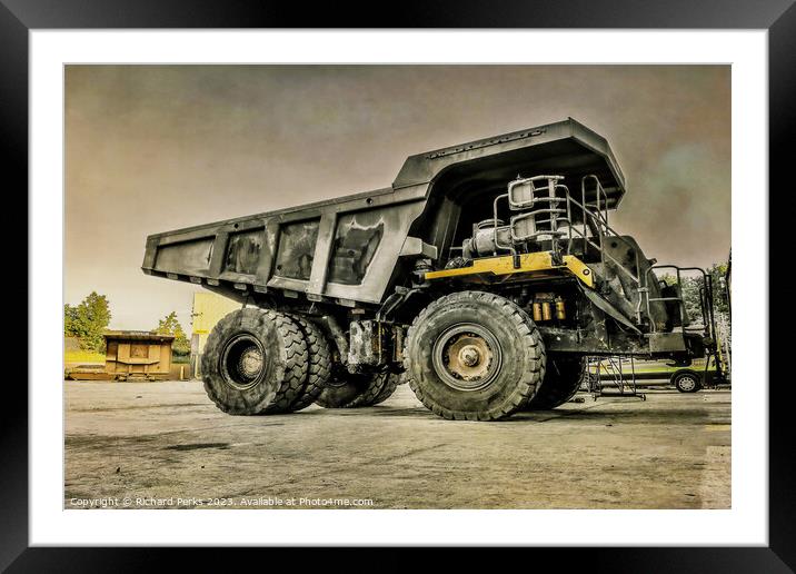 Caterpillar Machine at the workshop door Framed Mounted Print by Richard Perks