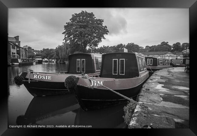 Rosie and Jim in the rain Framed Print by Richard Perks