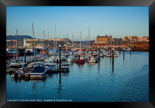Scarborough Harbour reflections Framed Print by Richard Perks