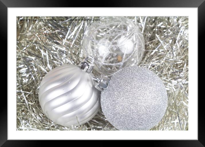 Christmas balls on tinsel Framed Mounted Print by aurélie le moigne