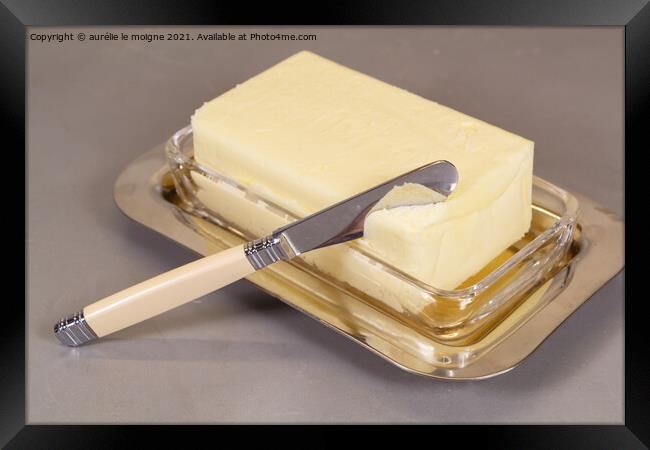 Pack of butter in a butter dish Framed Print by aurélie le moigne