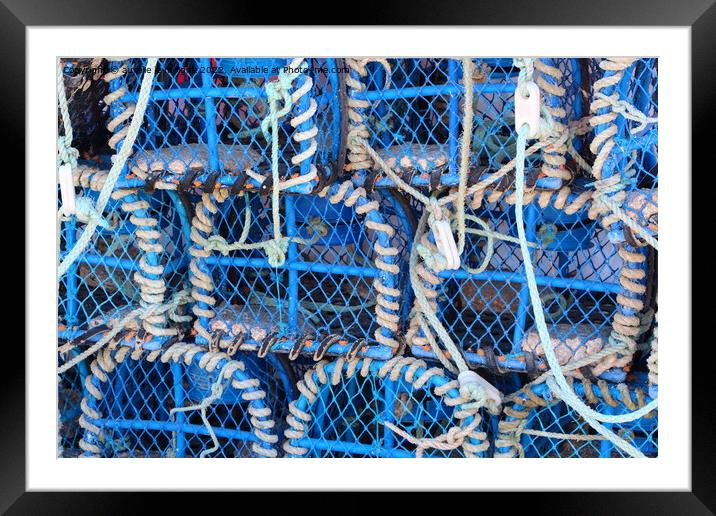 Heap of lobster pots Framed Mounted Print by aurélie le moigne