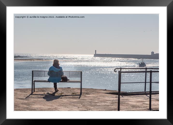 Woman sitting on a bench Framed Mounted Print by aurélie le moigne