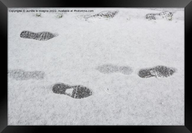 Footprints on snow Framed Print by aurélie le moigne