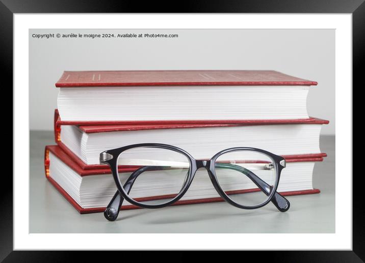 Heap of red books and glasses Framed Mounted Print by aurélie le moigne