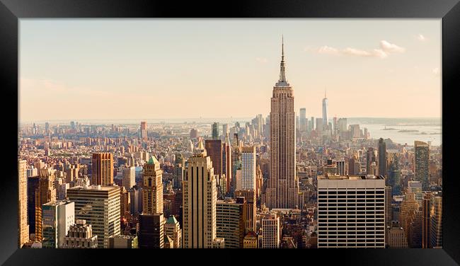 Sunset over Manhattan's Iconic Skyline Framed Print by Pere Sanz