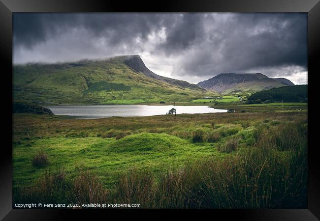 Dramatic Cloudy landscape in Snowdonia, Wales Framed Print by Pere Sanz