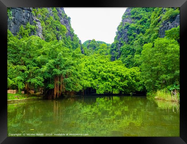 Quiet Ride On Peaceful Tam Coc River Framed Print by Nicolas Boivin