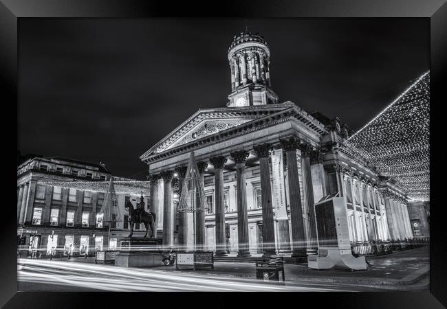 Goma, in Glasgow at night  Framed Print by James Reilly