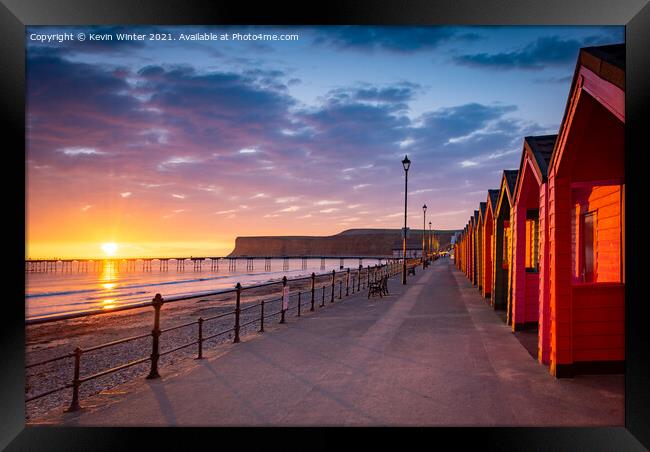Beach huts at sunrise Framed Print by Kevin Winter