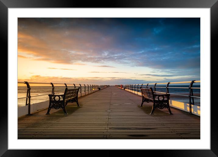 Saltburn pier sunset Framed Mounted Print by Kevin Winter