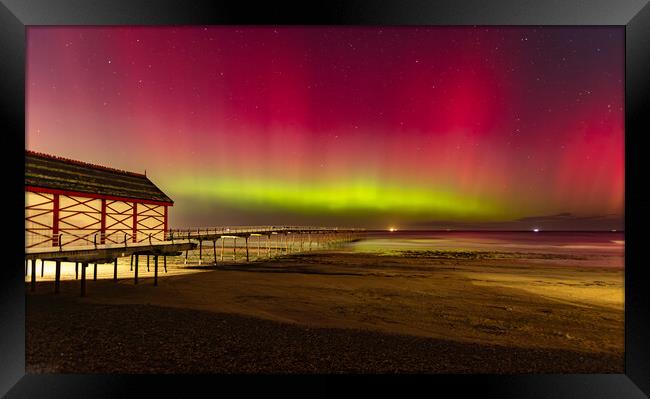 Aurora Borealis over Saltburn pier Framed Print by Kevin Winter