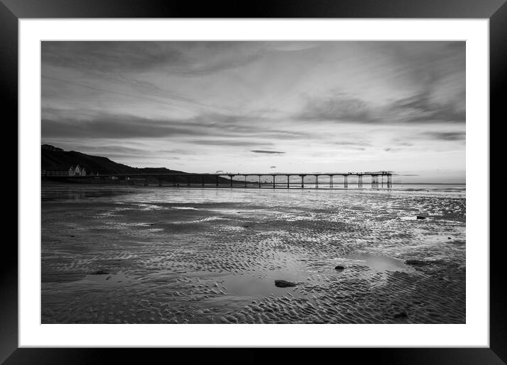 Sunset over Saltburn beach in Black and white Framed Mounted Print by Kevin Winter