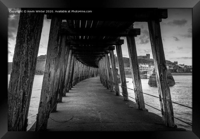 Under the East pier Framed Print by Kevin Winter