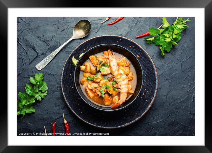 Tom yum soup with seafood and coconut milk,top vie Framed Mounted Print by Mykola Lunov Mykola