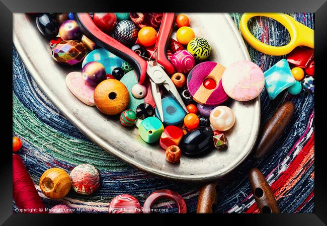 Various multicolored beads. Framed Print by Mykola Lunov Mykola
