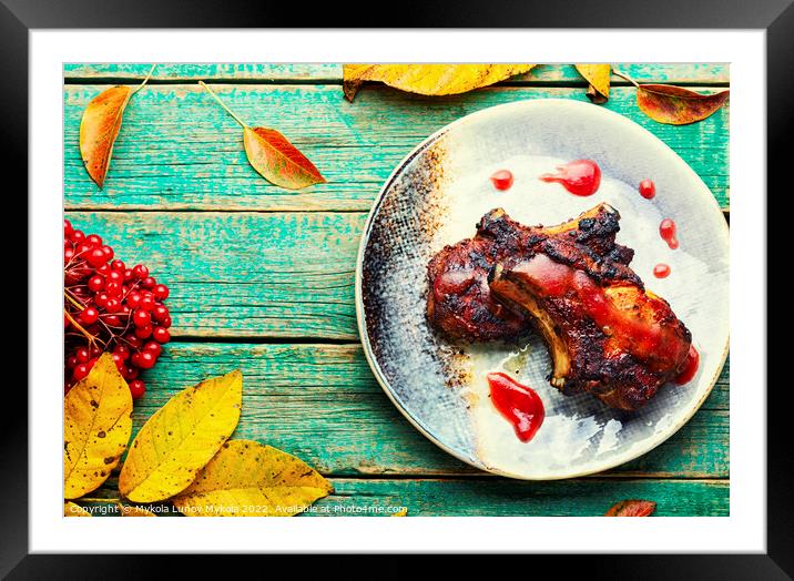 Steak with autumn berries on wooden table Framed Mounted Print by Mykola Lunov Mykola