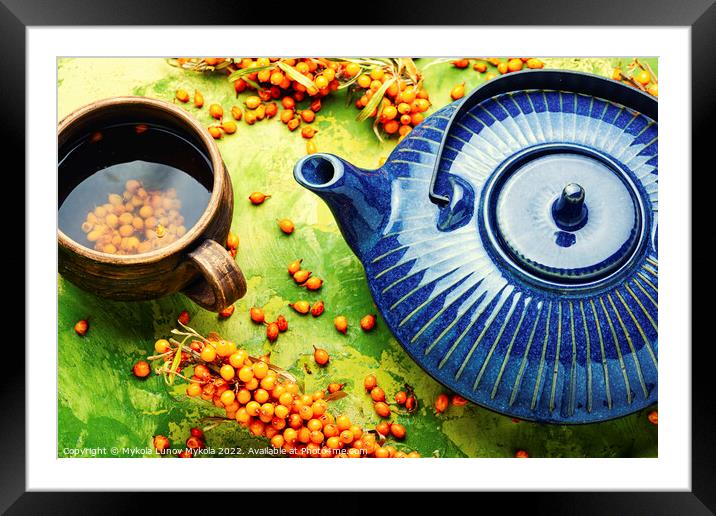 Tea with sea buckthorn, healthy drink Framed Mounted Print by Mykola Lunov Mykola