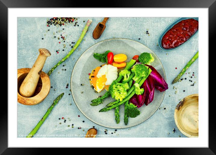 Fresh salad of asparagus, lettuce and poached eggs. Framed Mounted Print by Mykola Lunov Mykola