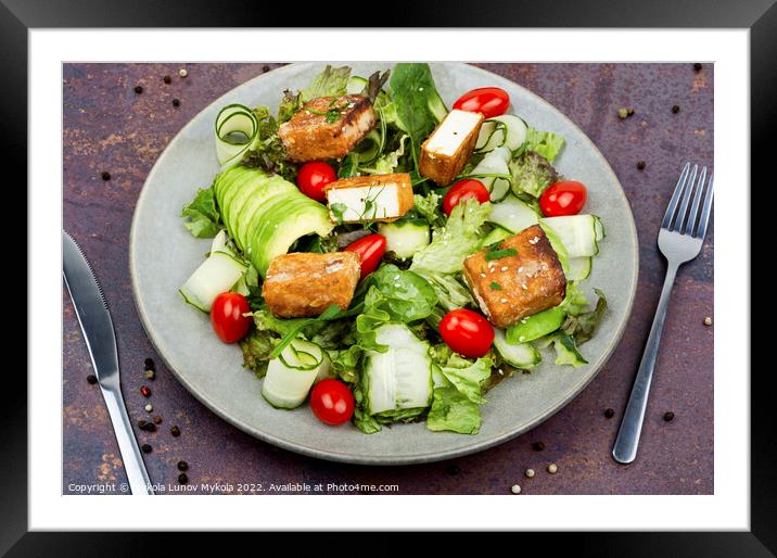 Salad of fried tofu and fresh vegetables. Framed Mounted Print by Mykola Lunov Mykola