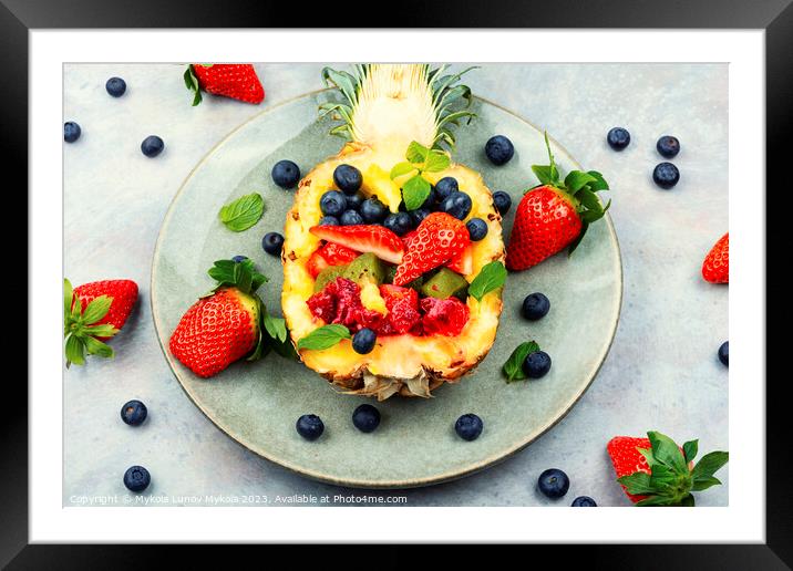 Fruit salad in a pineapple Framed Mounted Print by Mykola Lunov Mykola